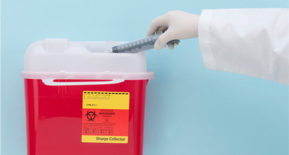 Photo of a sharps disposal container